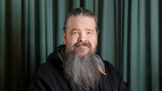 Kuvassa on informaatioteknologian yksikön tutkimuskoordinaattori Mikko Myllymäki.